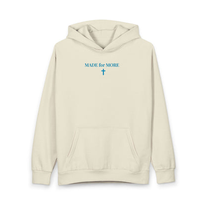 Beige hoodie with blue text MADE for MORE and a cross graphic on chest, front pocket, and hood